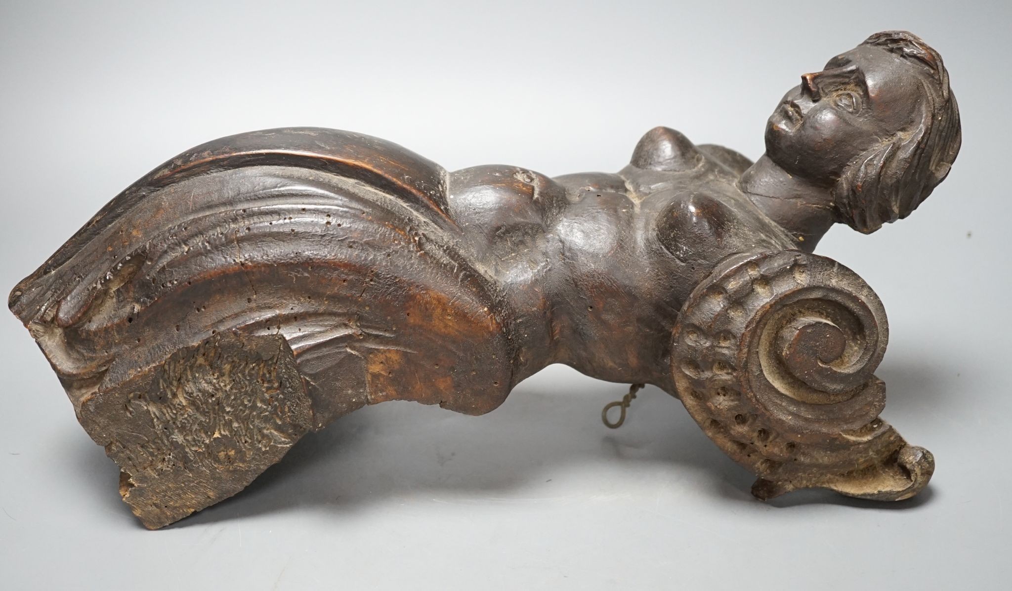 An 18th century Italian carved walnut or beech terminal figure, 38cm